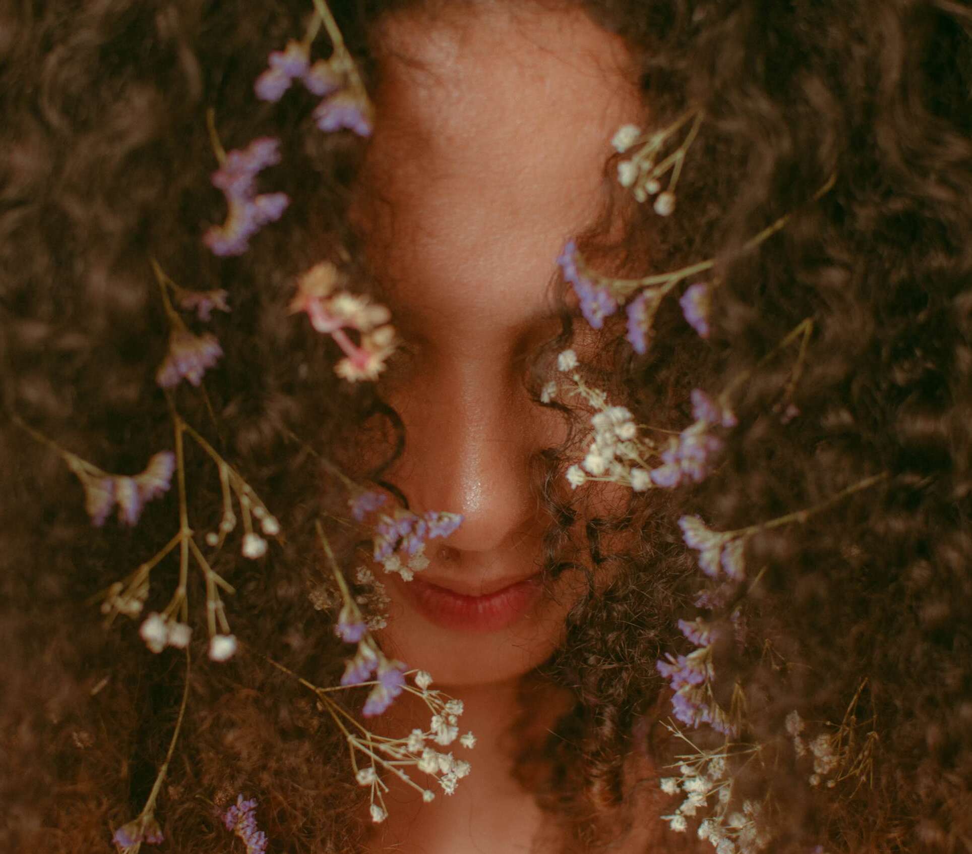 unrecognizable-woman-with-curly-hair-stockpack-pexels Unrecognizable woman with curly hair